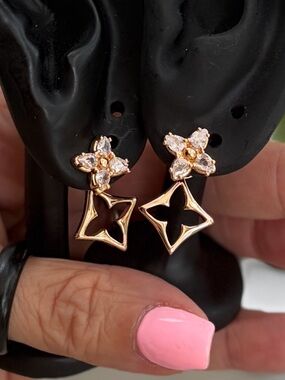 Rose Gold Floral CZ Drop Earrings with Open Star Charm